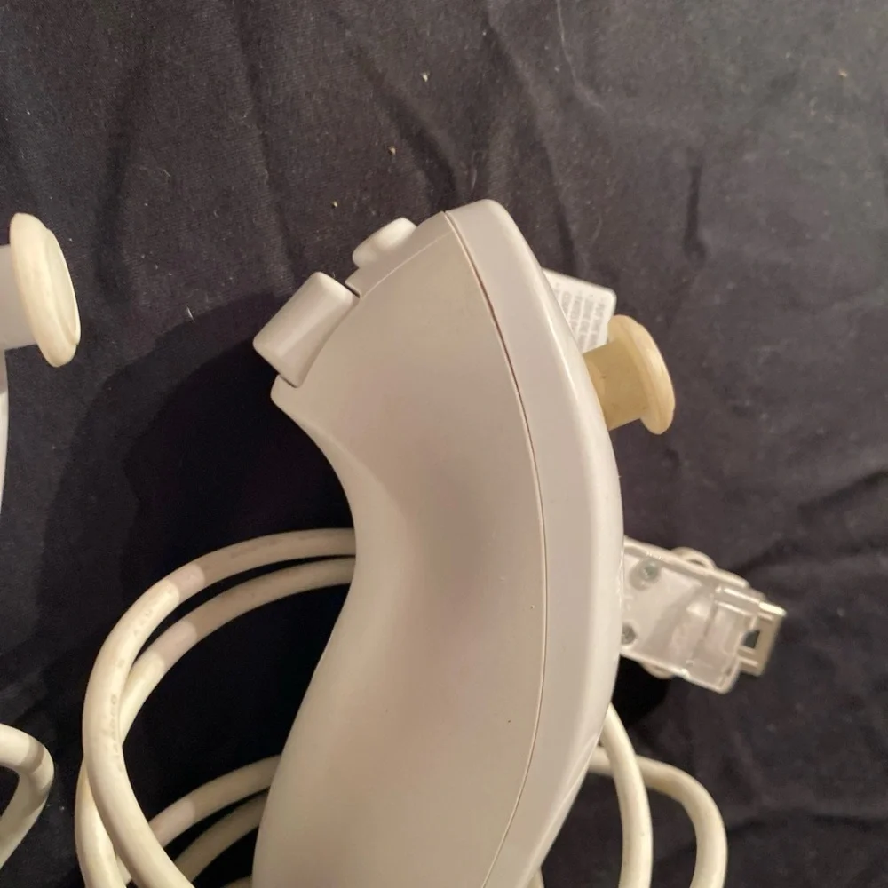 Nintendo Red and White Motion Nunchuk Controllers
